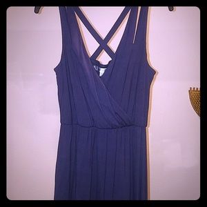 Drapey V neck sleeveless dress.